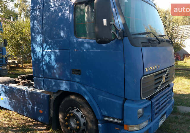 Синій Вольво FH 12, об'ємом двигуна 12.1 л та пробігом 111 тис. км за 6700 $, фото 2 на Automoto.ua