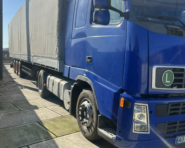 Синий Вольво FH 12, объемом двигателя 12.13 л и пробегом 600 тыс. км за 15500 $, фото 4 на Automoto.ua
