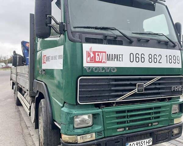 Зеленый Вольво FH 12, объемом двигателя 12.88 л и пробегом 355 тыс. км за 28000 $, фото 2 на Automoto.ua