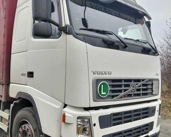 Белый Вольво FH 13, объемом двигателя 12.9 л и пробегом 800 тыс. км за 16500 $, фото 2 на Automoto.ua