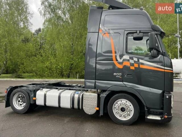 Черный Вольво FH 13, объемом двигателя 13 л и пробегом 900 тыс. км за 27300 $, фото 1 на Automoto.ua