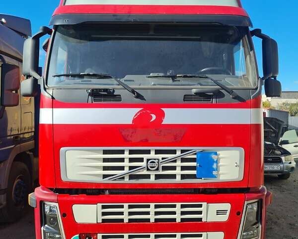 Красный Вольво FH 13, объемом двигателя 12.78 л и пробегом 450 тыс. км за 21000 $, фото 2 на Automoto.ua
