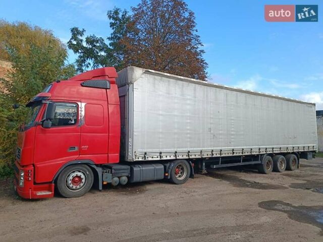 Вольво FH 13 2009 в Нововолынск на Automoto.ua Красный Вольво FH 13, объемом двигателя 12.78 л и пробегом 2 тыс. км за 14000 $, фото 1 на Automoto.ua