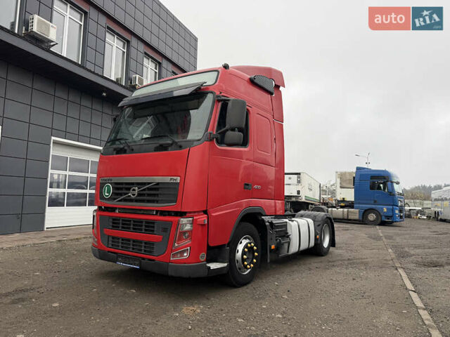 Красный Вольво FH 13, объемом двигателя 12.78 л и пробегом 1000 тыс. км за 18899 $, фото 2 на Automoto.ua