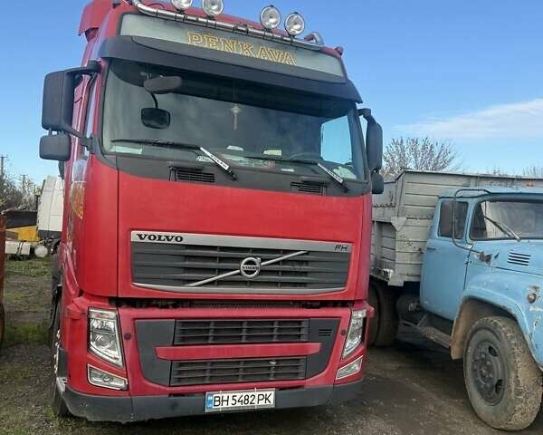 Красный Вольво FH 13, объемом двигателя 12.9 л и пробегом 1000 тыс. км за 28000 $, фото 1 на Automoto.ua