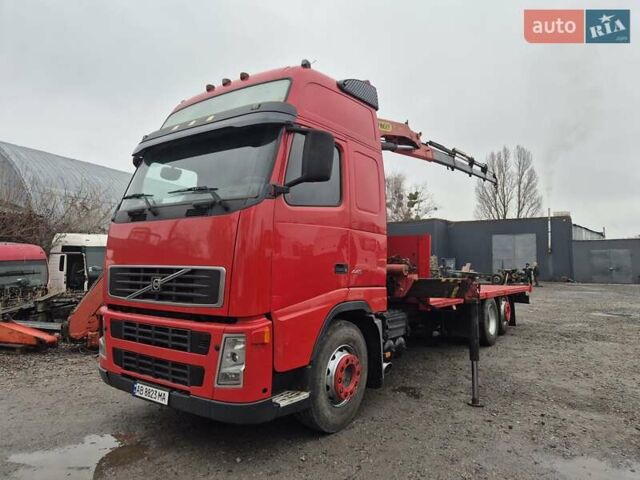 Красный Вольво FH 13, объемом двигателя 12.78 л и пробегом 458 тыс. км за 33800 $, фото 1 на Automoto.ua