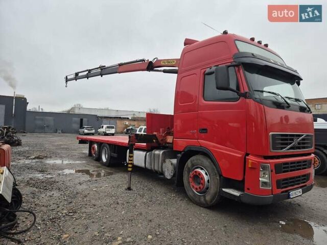 Красный Вольво FH 13, объемом двигателя 12.78 л и пробегом 458 тыс. км за 33800 $, фото 4 на Automoto.ua