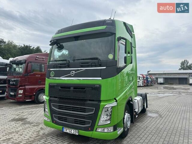 Зелений Вольво FH 13, об'ємом двигуна 12.7 л та пробігом 960 тис. км за 34900 $, фото 1 на Automoto.ua