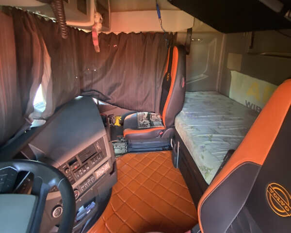 Оранжевый Вольво FH 13, объемом двигателя 12.78 л и пробегом 958 тыс. км за 40000 $, фото 13 на Automoto.ua