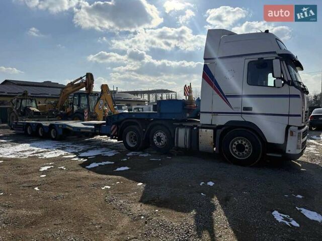Белый Вольво FH 16, объемом двигателя 12.8 л и пробегом 890 тыс. км за 44000 $, фото 1 на Automoto.ua