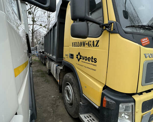Желтый Вольво ФМ 12, объемом двигателя 9.37 л и пробегом 450 тыс. км за 35500 $, фото 3 на Automoto.ua