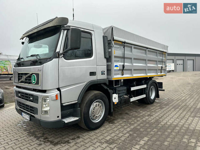 Серый Вольво ФМ 12, объемом двигателя 10.84 л и пробегом 893 тыс. км за 32996 $, фото 1 на Automoto.ua