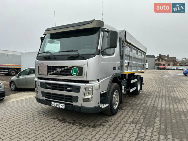 Серый Вольво ФМ 12, объемом двигателя 10.84 л и пробегом 893 тыс. км за 32996 $, фото 3 на Automoto.ua