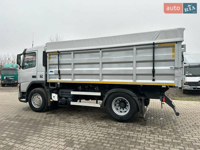 Серый Вольво ФМ 12, объемом двигателя 10.84 л и пробегом 893 тыс. км за 32996 $, фото 2 на Automoto.ua