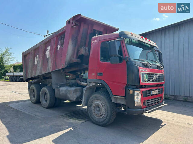 Красный Вольво FM 13, объемом двигателя 12.8 л и пробегом 380 тыс. км за 34000 $, фото 2 на Automoto.ua