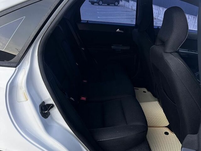 Білий Вольво S40, об'ємом двигуна 2 л та пробігом 278 тис. км за 6499 $, фото 31 на Automoto.ua