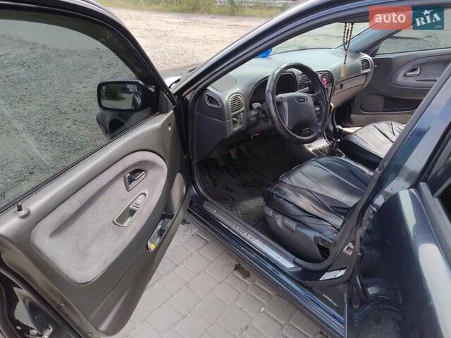 Черный Вольво С40, объемом двигателя 1.87 л и пробегом 338 тыс. км за 4200 $, фото 9 на Automoto.ua