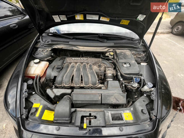 Чорний Вольво S40, об'ємом двигуна 2.44 л та пробігом 215 тис. км за 5300 $, фото 1 на Automoto.ua