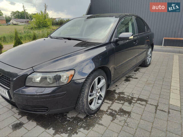 Черный Вольво С40, объемом двигателя 2 л и пробегом 328 тыс. км за 4400 $, фото 16 на Automoto.ua