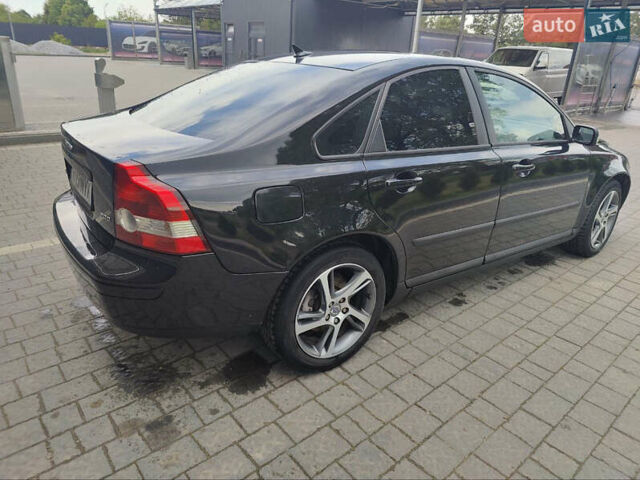 Черный Вольво С40, объемом двигателя 2 л и пробегом 328 тыс. км за 4400 $, фото 8 на Automoto.ua