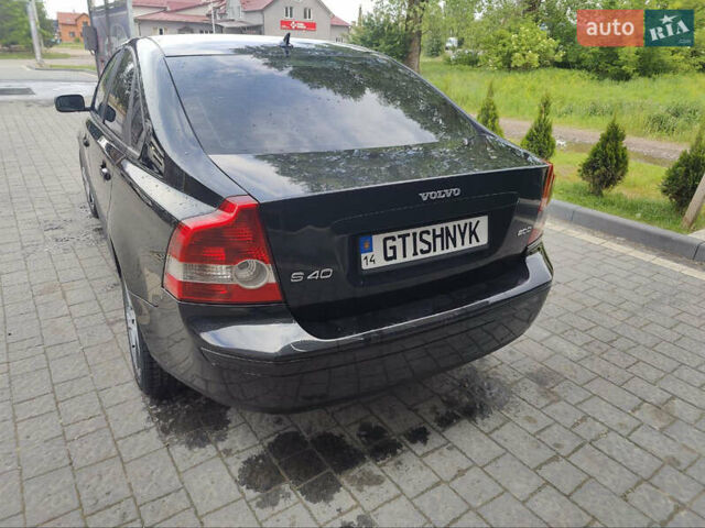 Черный Вольво С40, объемом двигателя 2 л и пробегом 328 тыс. км за 4400 $, фото 7 на Automoto.ua