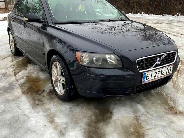 Чорний Вольво S40, об'ємом двигуна 1.6 л та пробігом 413 тис. км за 6600 $, фото 1 на Automoto.ua