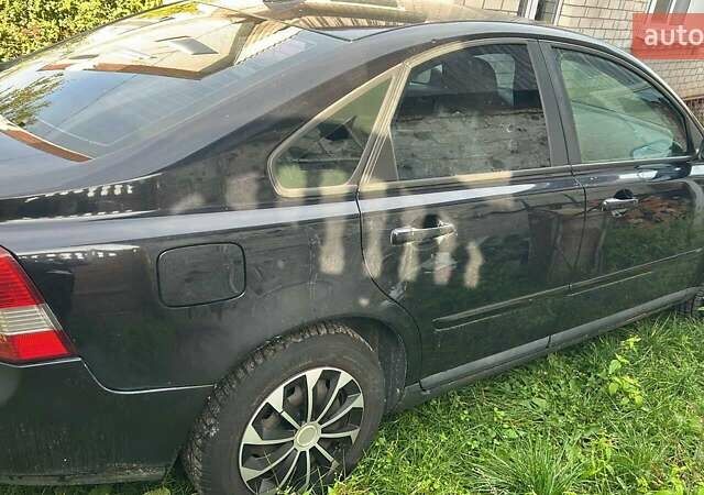 Черный Вольво С40, объемом двигателя 1.6 л и пробегом 319 тыс. км за 5300 $, фото 7 на Automoto.ua