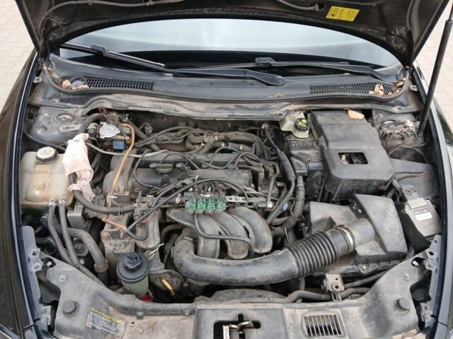 Черный Вольво С40, объемом двигателя 1.6 л и пробегом 220 тыс. км за 5500 $, фото 16 на Automoto.ua