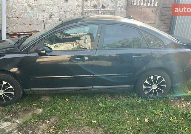 Черный Вольво С40, объемом двигателя 1.6 л и пробегом 319 тыс. км за 5300 $, фото 1 на Automoto.ua