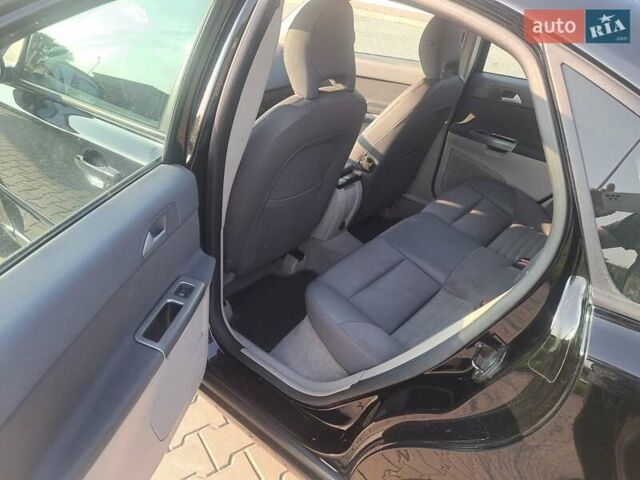 Черный Вольво С40, объемом двигателя 1.8 л и пробегом 275 тыс. км за 5900 $, фото 25 на Automoto.ua