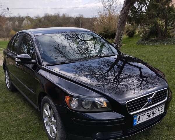 Чорний Вольво S40, об'ємом двигуна 1.56 л та пробігом 298 тис. км за 5700 $, фото 1 на Automoto.ua