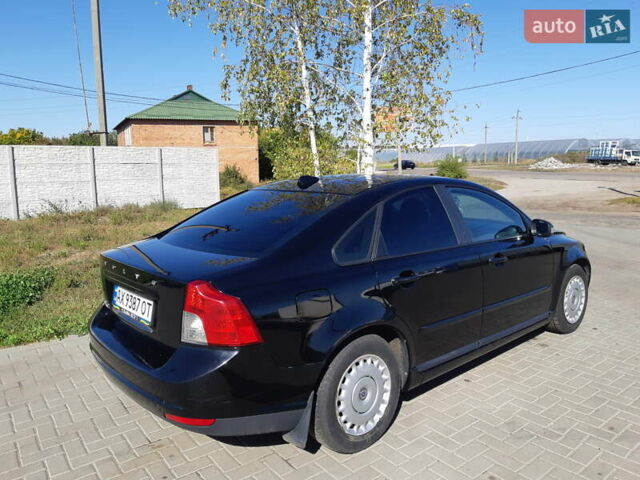 Чорний Вольво S40, об'ємом двигуна 1.6 л та пробігом 251 тис. км за 7000 $, фото 1 на Automoto.ua