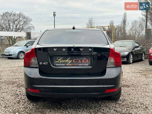 Черный Вольво С40, объемом двигателя 1.6 л и пробегом 51 тыс. км за 6300 $, фото 5 на Automoto.ua