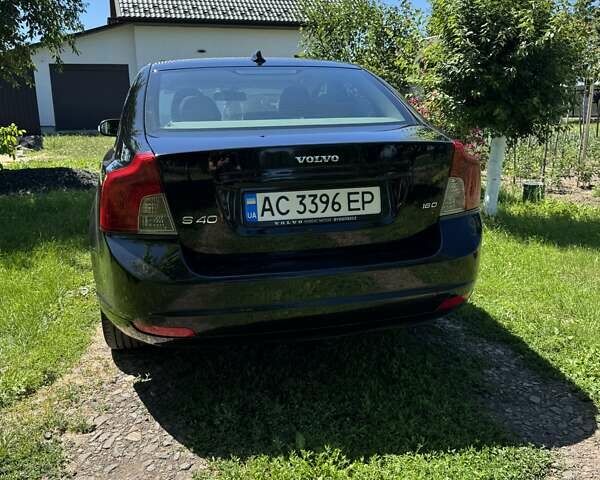 Черный Вольво С40, объемом двигателя 1.6 л и пробегом 305 тыс. км за 6450 $, фото 4 на Automoto.ua