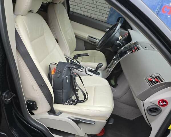 Черный Вольво С40, объемом двигателя 2 л и пробегом 291 тыс. км за 7900 $, фото 12 на Automoto.ua