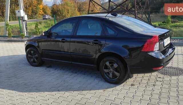 Чорний Вольво S40, об'ємом двигуна 1.6 л та пробігом 255 тис. км за 6100 $, фото 2 на Automoto.ua