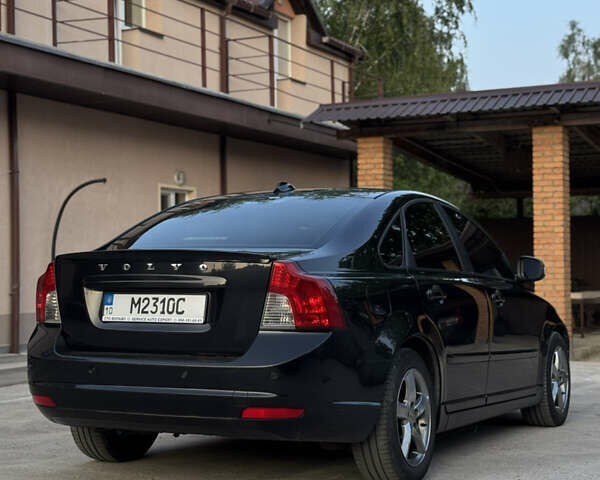 Черный Вольво С40, объемом двигателя 1.56 л и пробегом 286 тыс. км за 8000 $, фото 5 на Automoto.ua