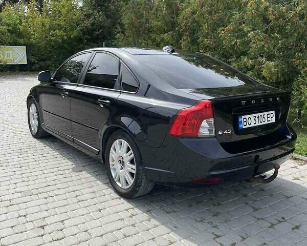 Черный Вольво С40, объемом двигателя 1.6 л и пробегом 263 тыс. км за 7200 $, фото 2 на Automoto.ua