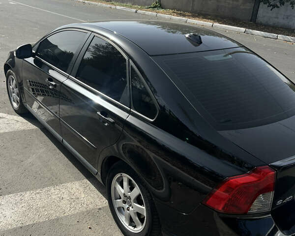 Чорний Вольво S40, об'ємом двигуна 1.6 л та пробігом 318 тис. км за 7400 $, фото 4 на Automoto.ua