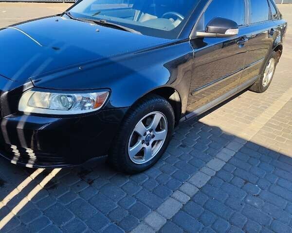 Черный Вольво С40, объемом двигателя 1.6 л и пробегом 241 тыс. км за 7700 $, фото 6 на Automoto.ua