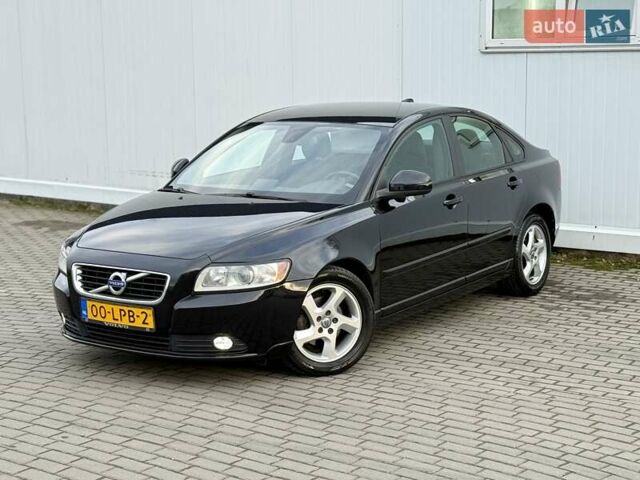 Черный Вольво С40, объемом двигателя 1.6 л и пробегом 236 тыс. км за 8750 $, фото 1 на Automoto.ua