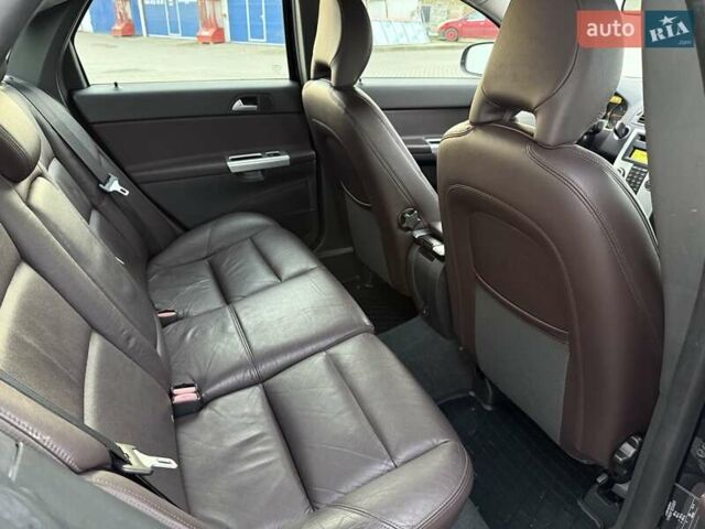 Черный Вольво С40, объемом двигателя 1.6 л и пробегом 236 тыс. км за 8750 $, фото 28 на Automoto.ua