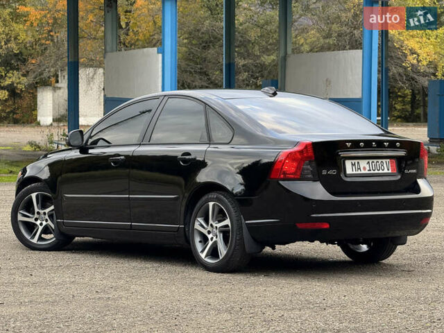 Черный Вольво С40, объемом двигателя 1.6 л и пробегом 210 тыс. км за 8800 $, фото 24 на Automoto.ua
