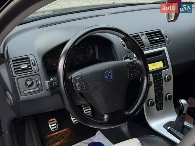 Черный Вольво С40, объемом двигателя 1.6 л и пробегом 210 тыс. км за 8800 $, фото 58 на Automoto.ua