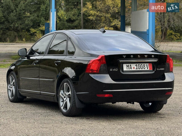 Черный Вольво С40, объемом двигателя 1.6 л и пробегом 210 тыс. км за 8800 $, фото 37 на Automoto.ua