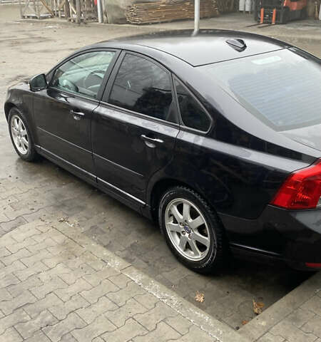 Черный Вольво С40, объемом двигателя 1.56 л и пробегом 154 тыс. км за 9800 $, фото 1 на Automoto.ua