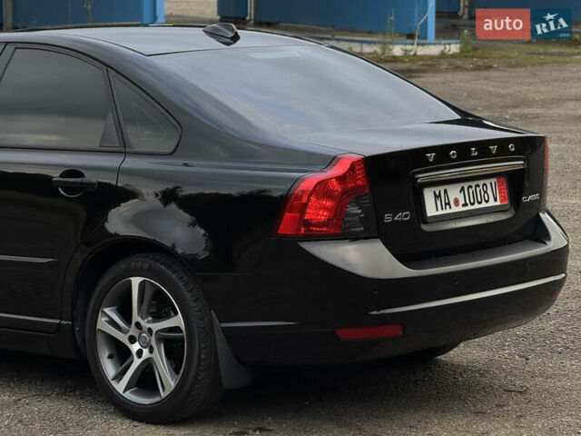 Черный Вольво С40, объемом двигателя 1.6 л и пробегом 210 тыс. км за 8800 $, фото 39 на Automoto.ua
