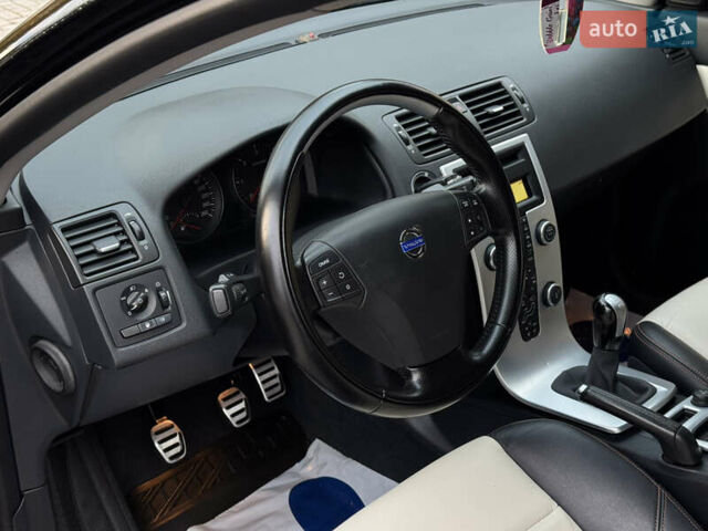 Черный Вольво С40, объемом двигателя 1.6 л и пробегом 210 тыс. км за 8800 $, фото 57 на Automoto.ua