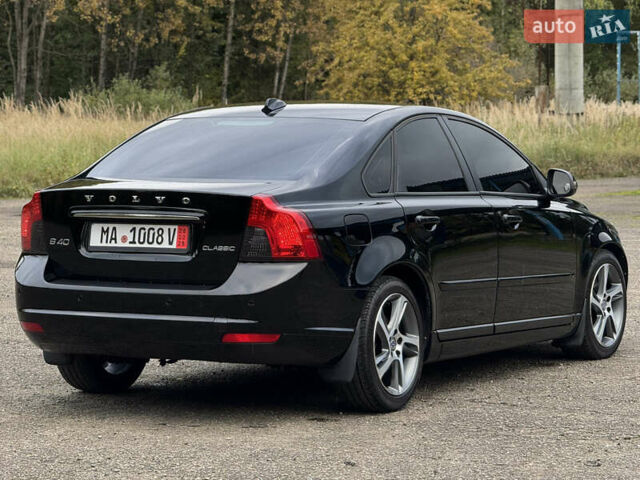 Черный Вольво С40, объемом двигателя 1.6 л и пробегом 210 тыс. км за 8800 $, фото 34 на Automoto.ua