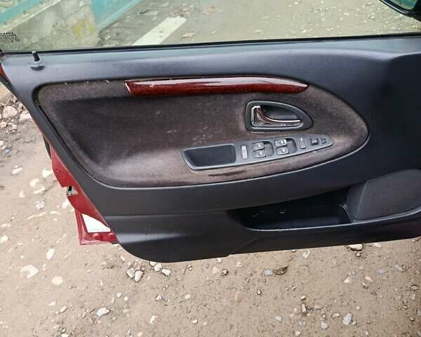 Красный Вольво С40, объемом двигателя 1.87 л и пробегом 359 тыс. км за 1850 $, фото 2 на Automoto.ua